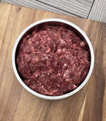 Bowl of Midwest Legacy Beef BLT and Bone raw dog food prepared for feeding
