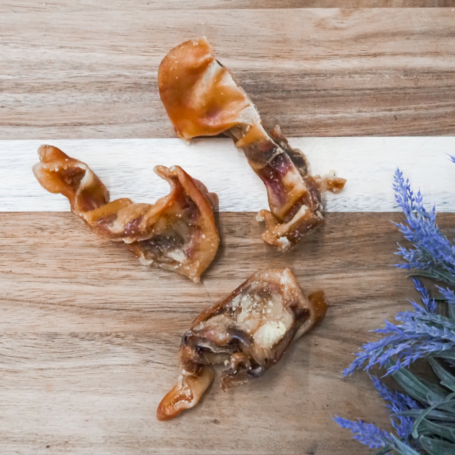 USA-sourced pig ear strips dog treats, natural single-ingredient chew for dogs.