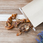 All-natural pig ear strips for dogs, high-protein fully digestible chew treat.