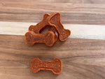 Sweet potato and pumpkin dog bones, all-natural grain-free treats for healthy digestion.