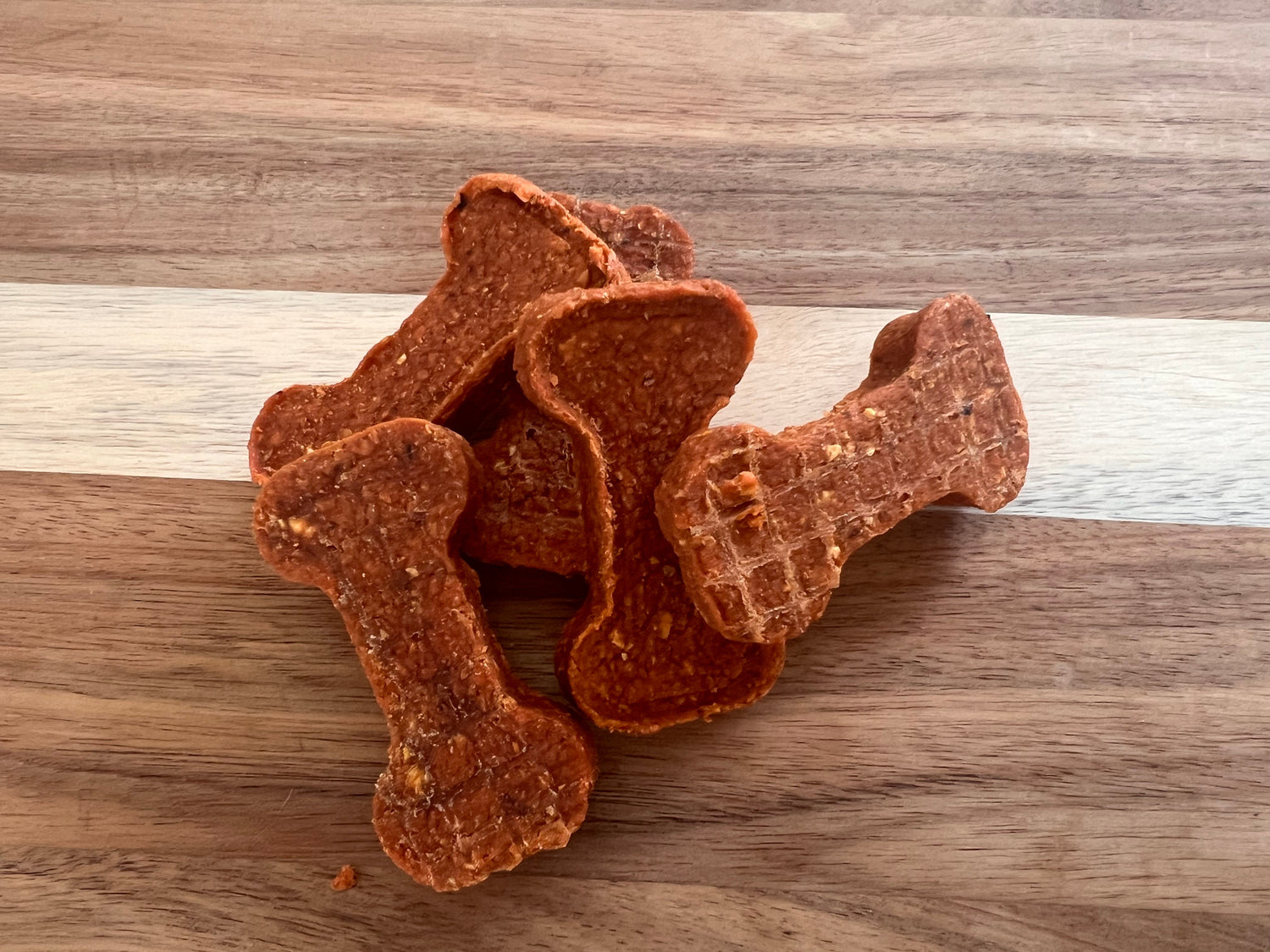 Sweet potato and pumpkin dog bones, all-natural grain-free treats for healthy digestion.