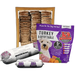 Packaged frozen raw dog food with turkey and vegetables. The packaging shows the product name, 'Turkey & Vegetable', and an image of a small white dog.